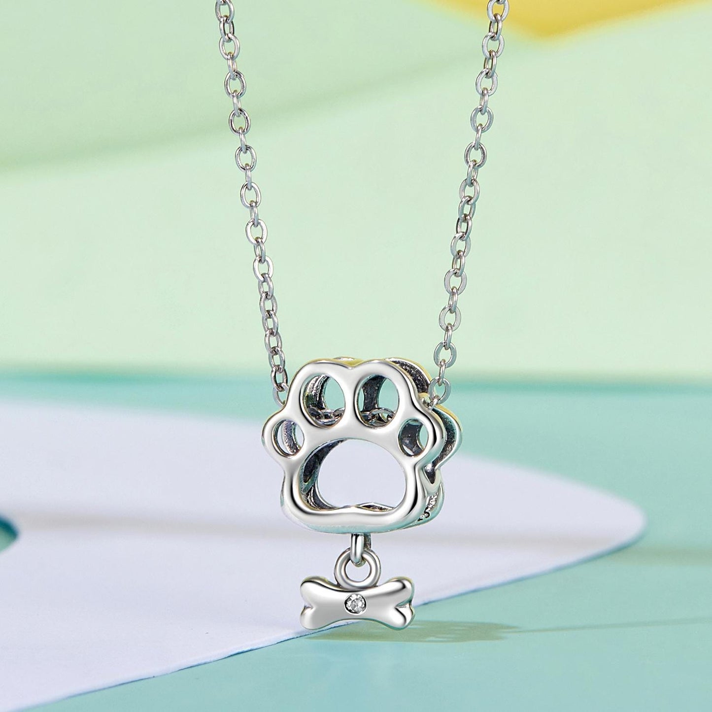 Hollowed Dog Paw Charm