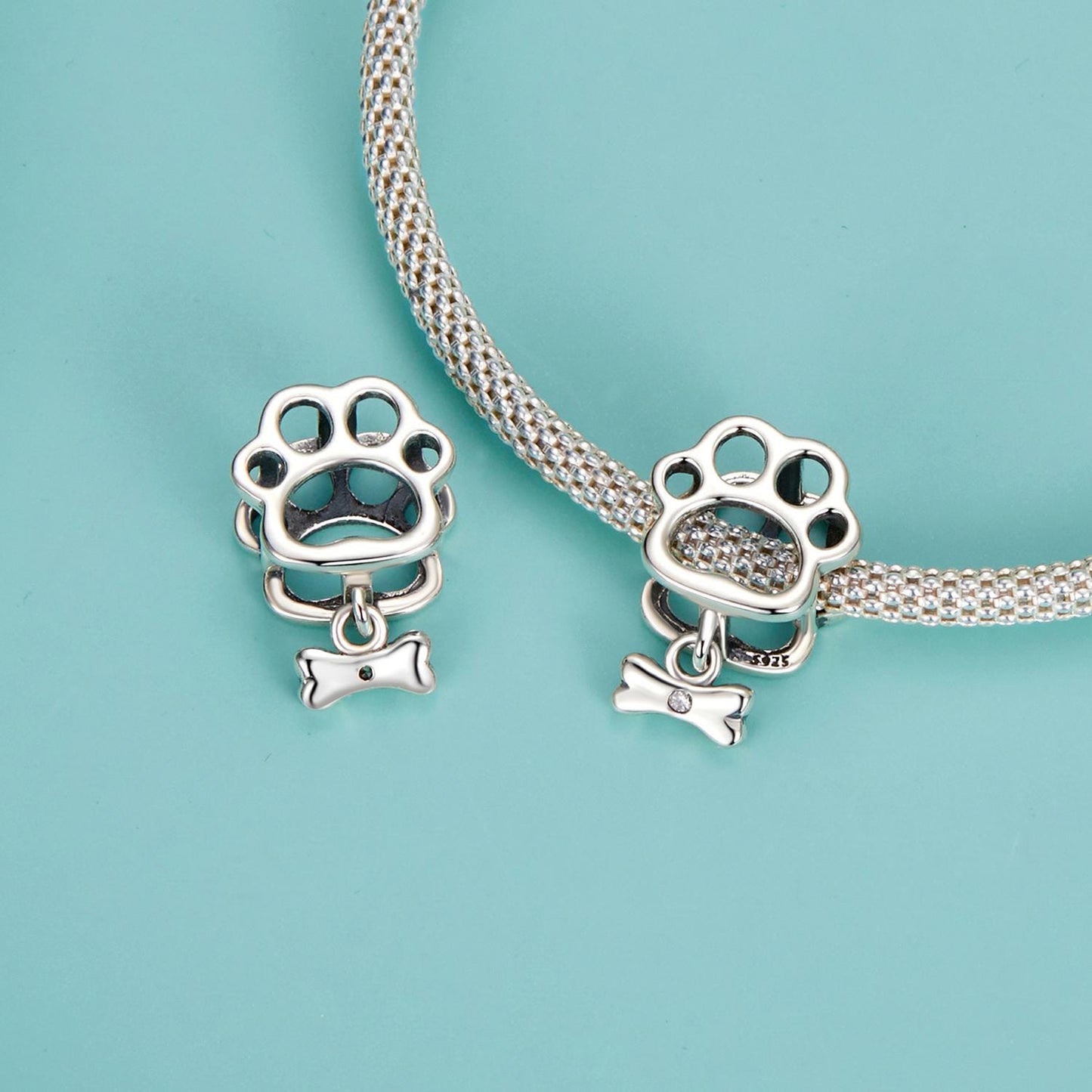 Hollowed Dog Paw Charm