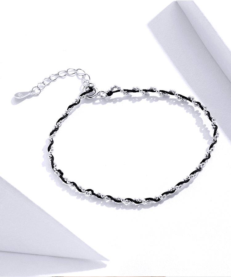 Compact Red String Bracelet
