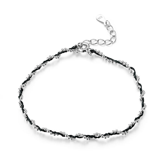 Compact Red String Bracelet