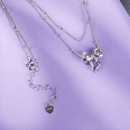 Glittering Bow Pendant Necklace