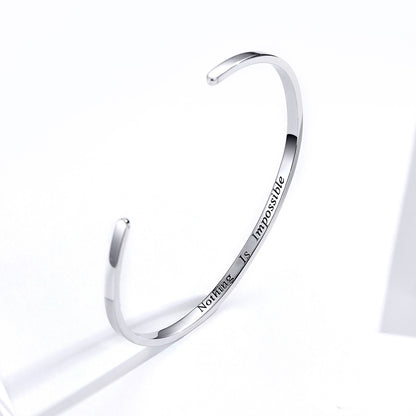 Forward Motion Silver Bangle
