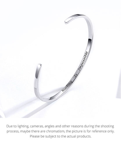 Forward Motion Silver Bangle